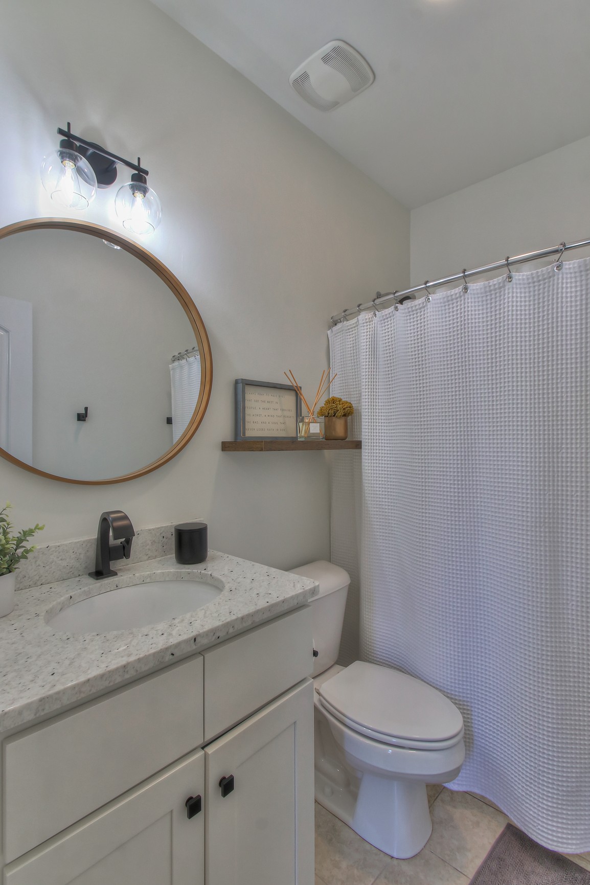 6032 Sanmar Drive Spring Hill, TN 37174 - Photo 20 of 29 a bathroom with a granite countertop toilet sink and mirror