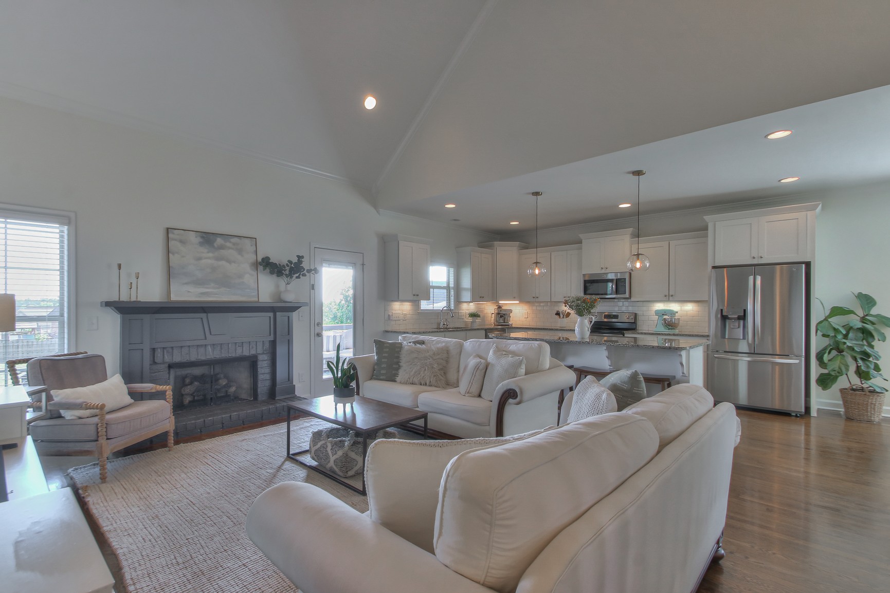 6032 Sanmar Drive Spring Hill, TN 37174 - Photo 5 of 29 a living room with furniture and a fireplace