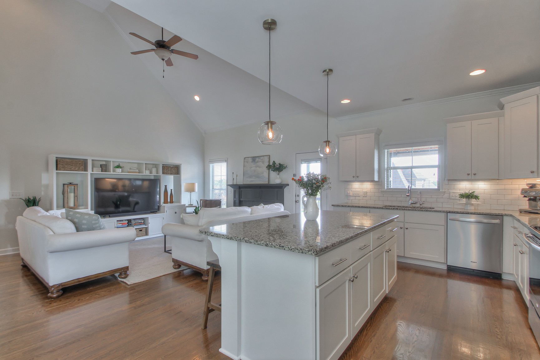 6032 Sanmar Drive Spring Hill, TN 37174 - Photo 9 of 29 a kitchen with stainless steel appliances granite countertop a sink stove and refrigerator