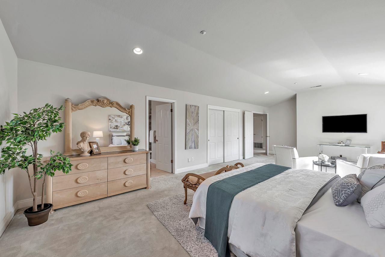 751 Pecan Way Campbell, CA 95008 - Photo 21 of 36 a bedroom with a bed and a potted plant