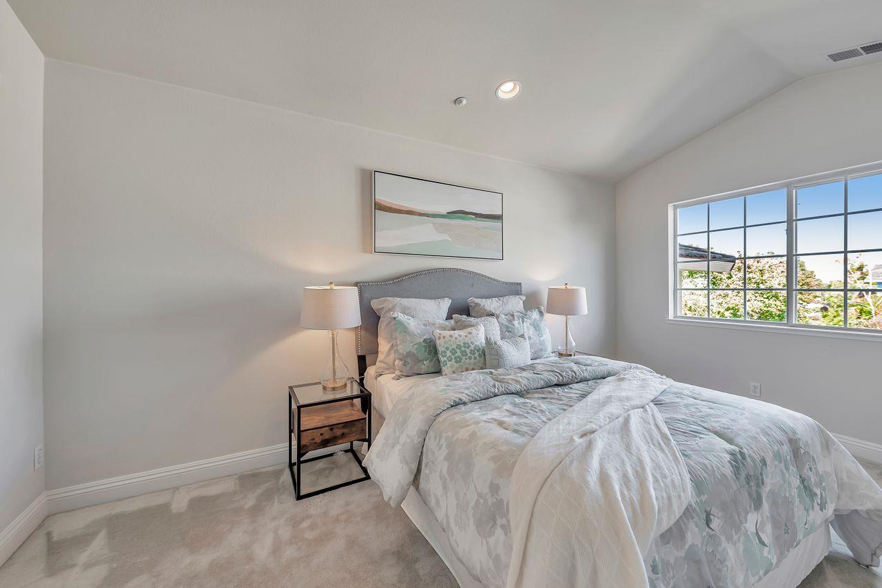 751 Pecan Way Campbell, CA 95008 - Photo 25 of 36 a bedroom with a bed and a window