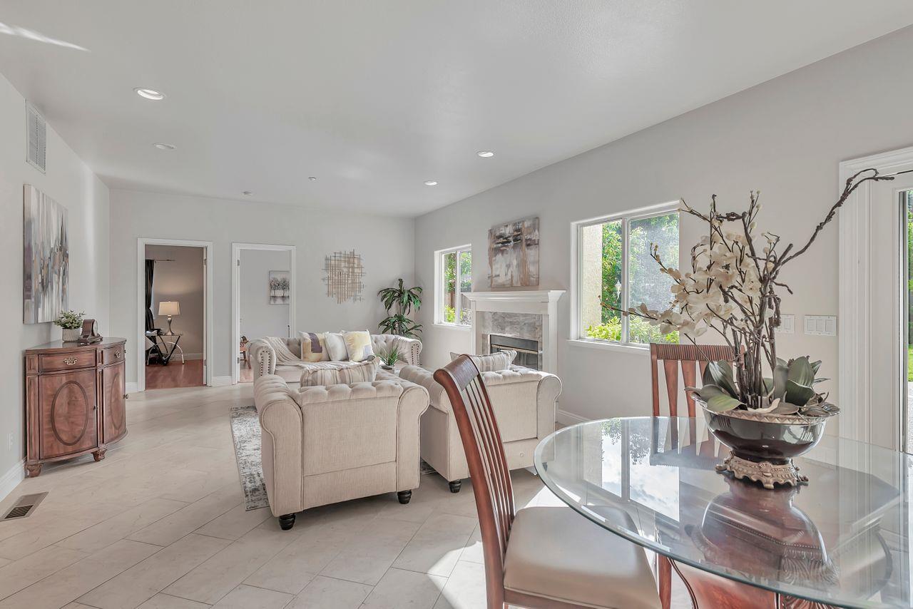 751 Pecan Way Campbell, CA 95008 - Photo 7 of 36 a living room with furniture a dining table and a potted plant