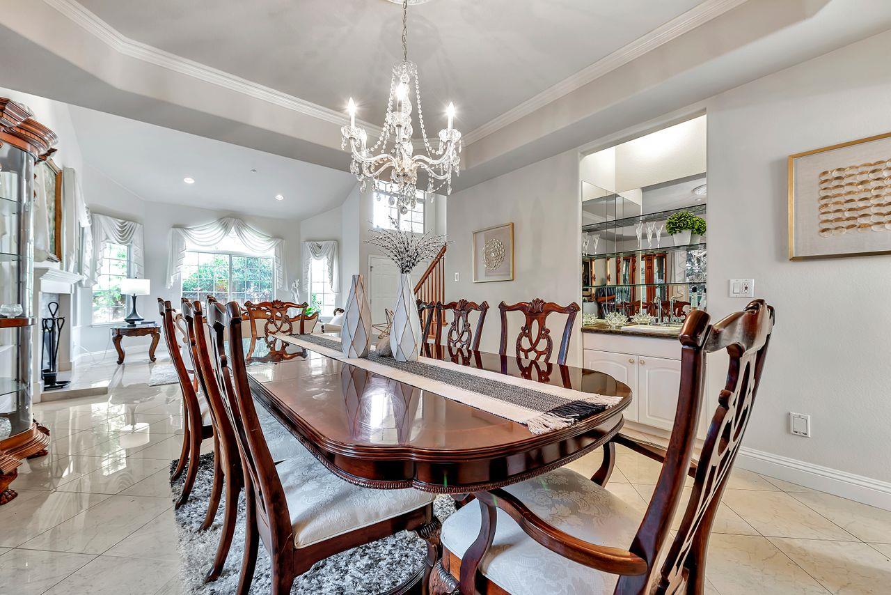 751 Pecan Way Campbell, CA 95008 - Photo 8 of 36 a view of a dining room with furniture and a chandelier