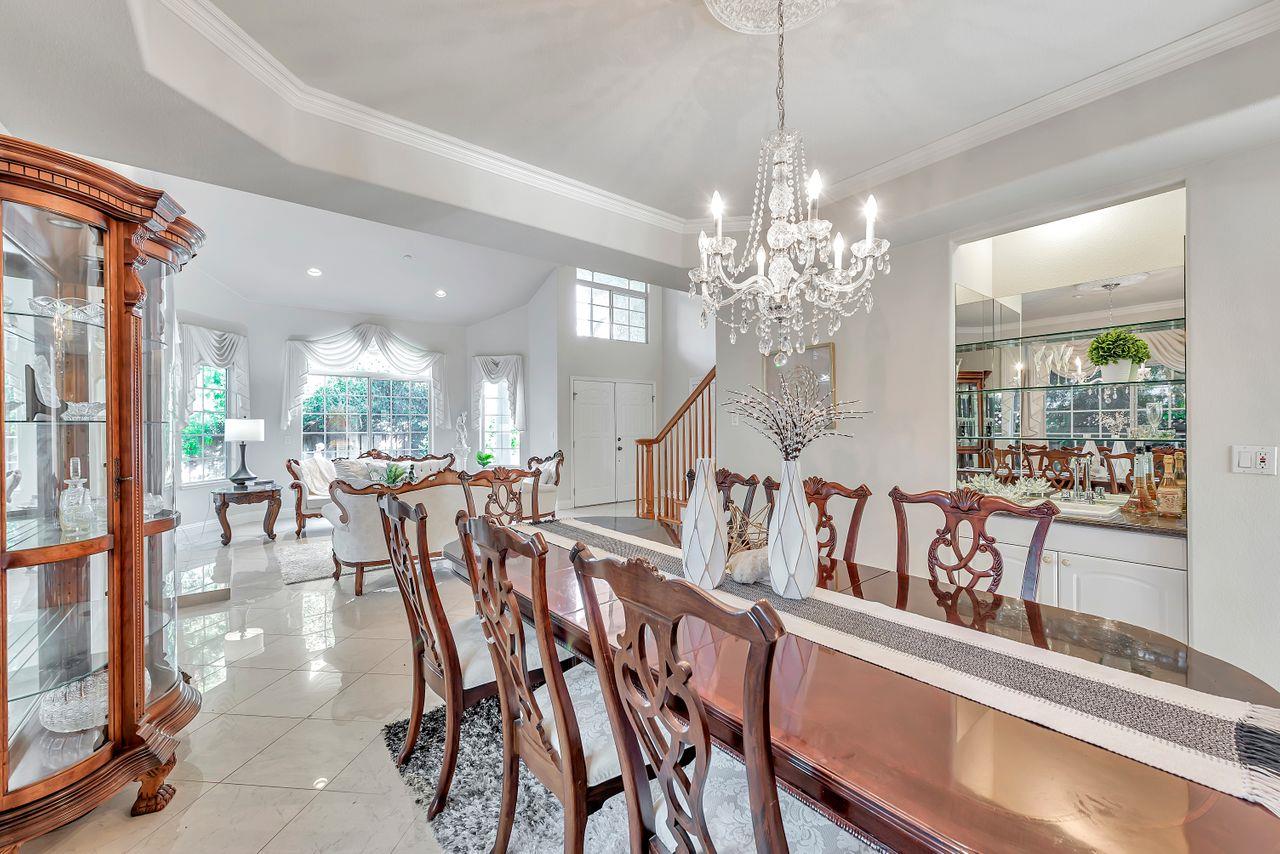 751 Pecan Way Campbell, CA 95008 - Photo 9 of 36 a view of a dining room with furniture a chandelier and wooden floor
