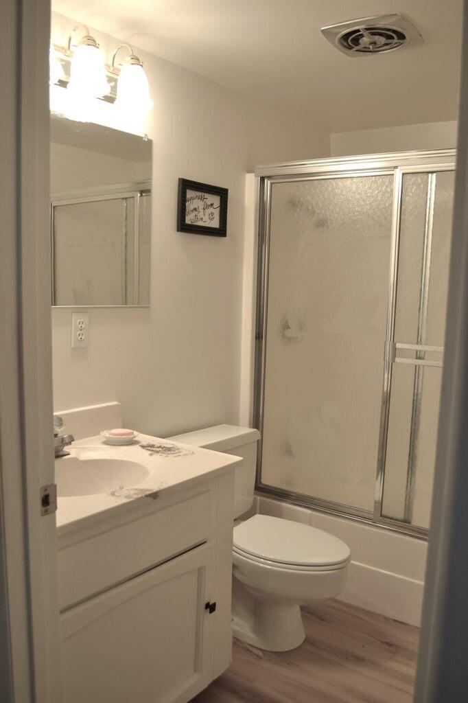523-400 South Grasshopper Road Termo, CA 96132 - Photo 21 of 44 a bathroom with a toilet a sink and shower