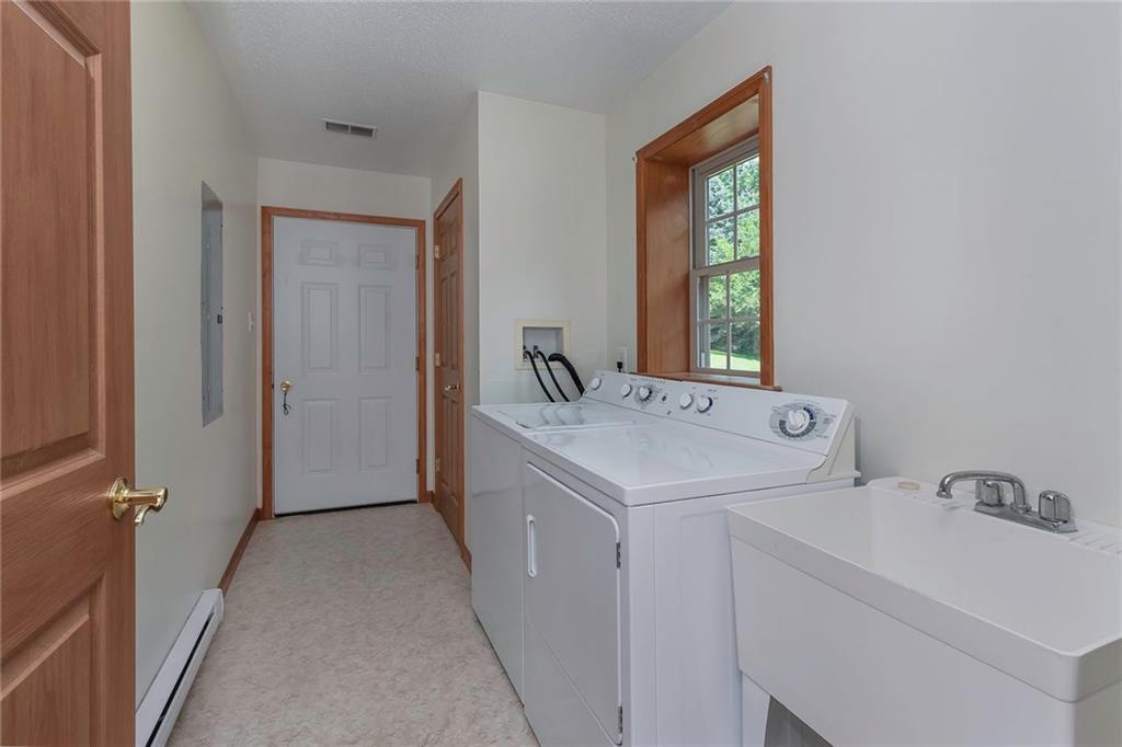 16 Allison Road Bulger, PA 15019 - Photo 14 of 24 Door From Garage Leads You Into The Laundry AreaWasher & Dryer Included