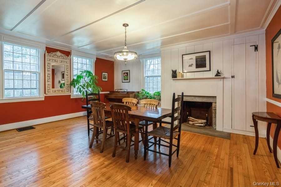1141 Beekman Road Hopewell Junction, NY 12533 - Photo 11 of 36 a view of a dining room with furniture window and wooden floor