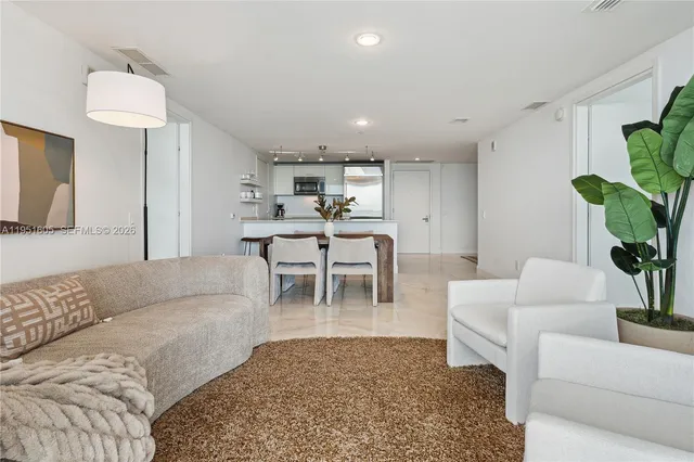 a living room with furniture and a couch