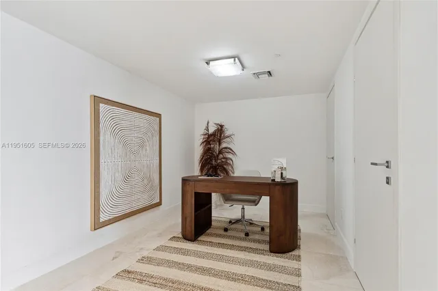 a view of a hallway with entryway