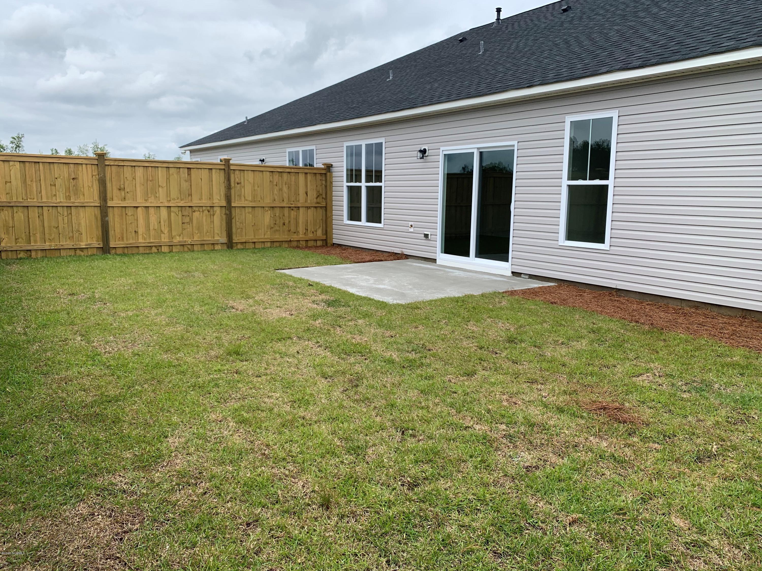 6425 Pinnacle Point Winnabow, NC 28479 - Photo 4 of 13 DMC 200 Backyard