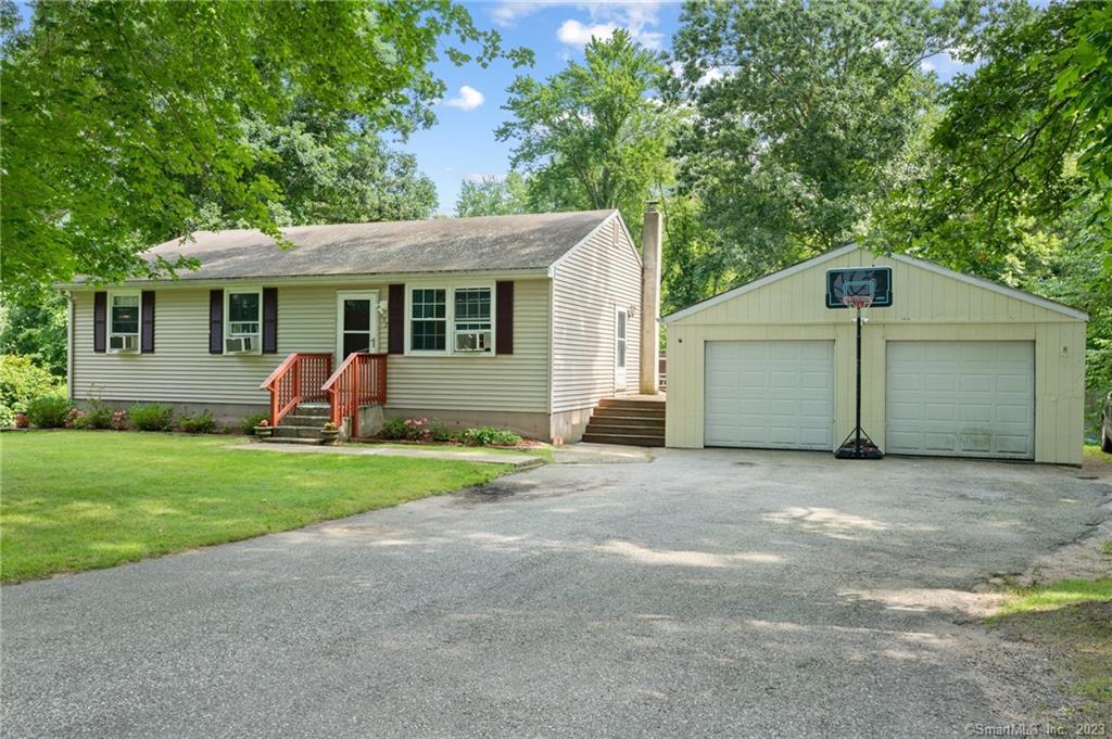 front view of a house with a yard