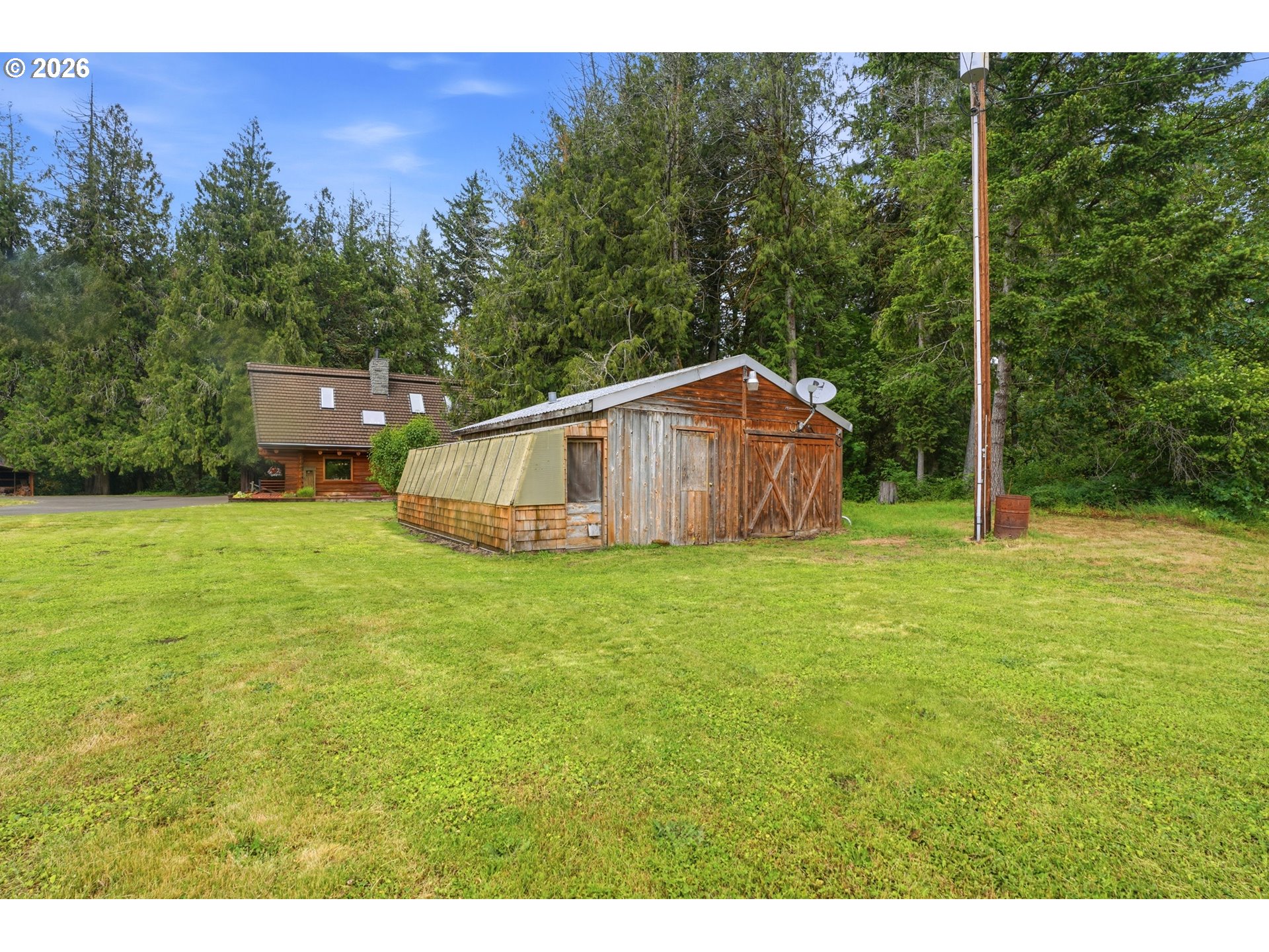 29870 South Dhooghe Road Colton, OR 97017 - Photo 46 of 48 a house with green field in front of it