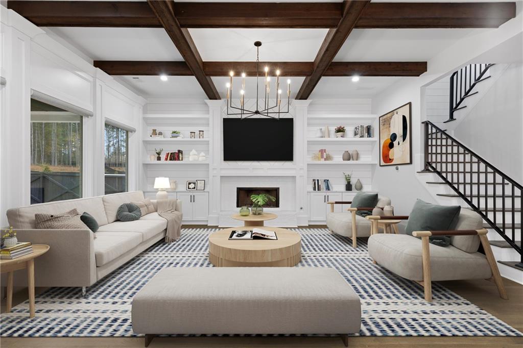 2381 Jones Phillips Road Dacula, GA 30019 - Photo 17 of 57 a living room with furniture a fireplace and a flat screen tv