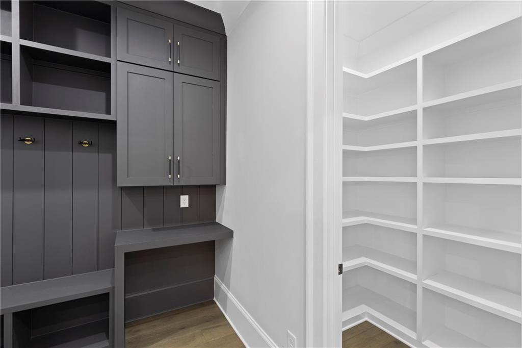 2381 Jones Phillips Road Dacula, GA 30019 - Photo 20 of 57 a view of walk in closet with empty racks