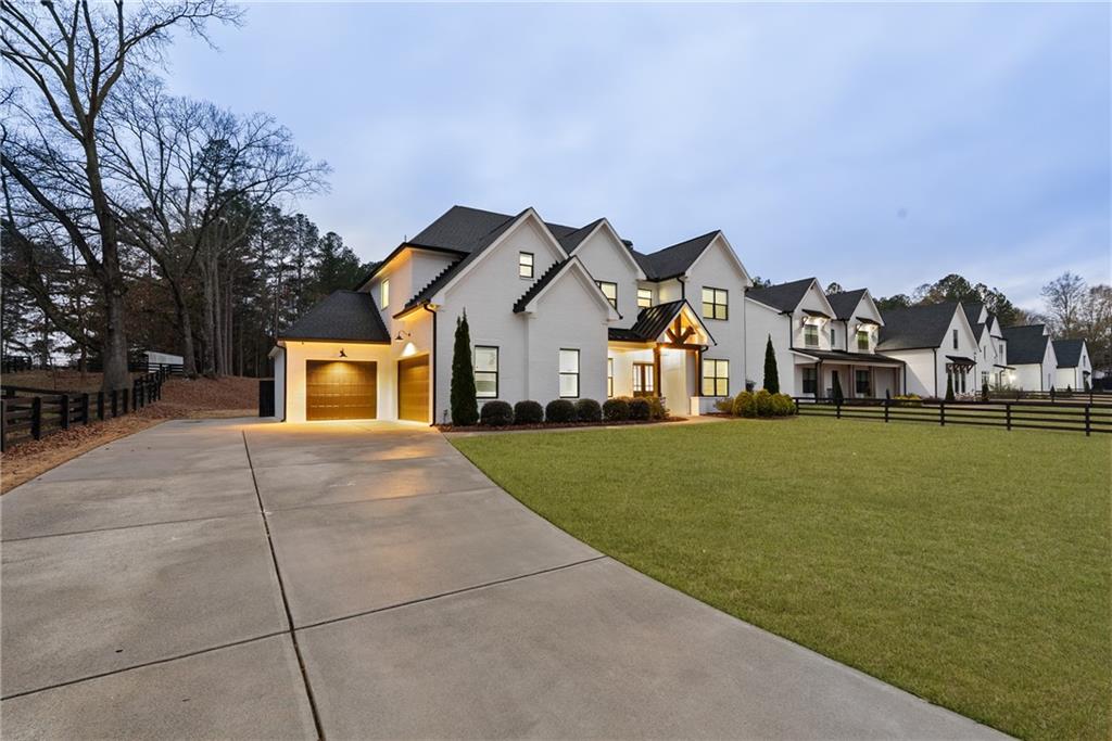 2381 Jones Phillips Road Dacula, GA 30019 - Photo 4 of 57 a view of house and outdoor space