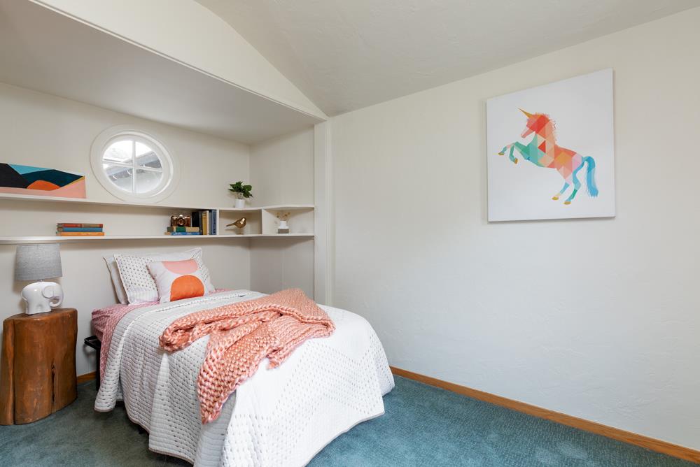244 Aptos Beach Drive Aptos, CA 95003 - Photo 19 of 32 a bedroom with a bed and painting on the wall