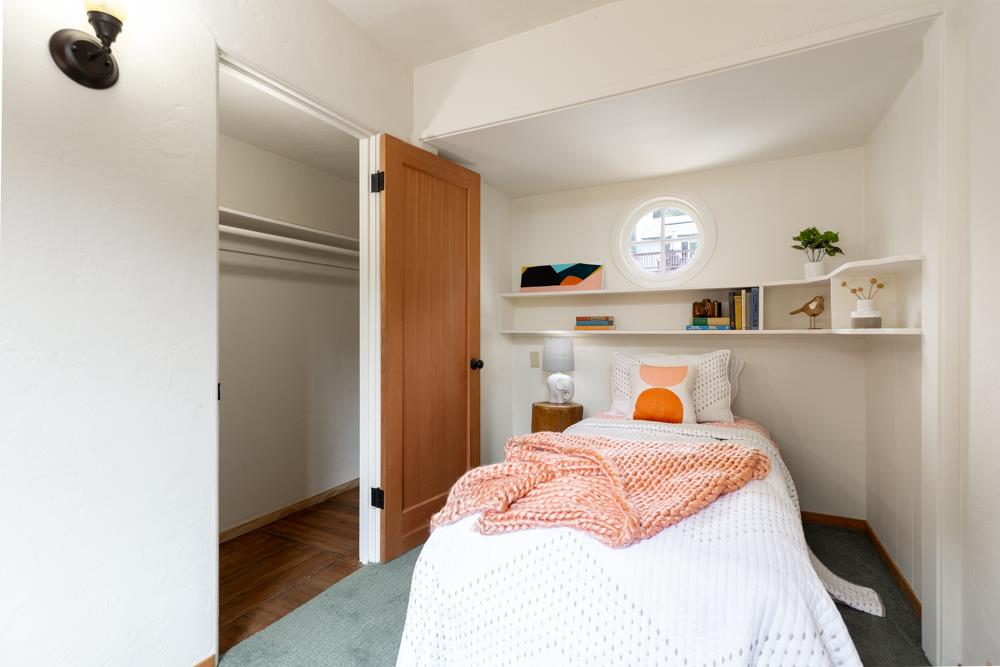 244 Aptos Beach Drive Aptos, CA 95003 - Photo 20 of 32 a bedroom with a bed and a window