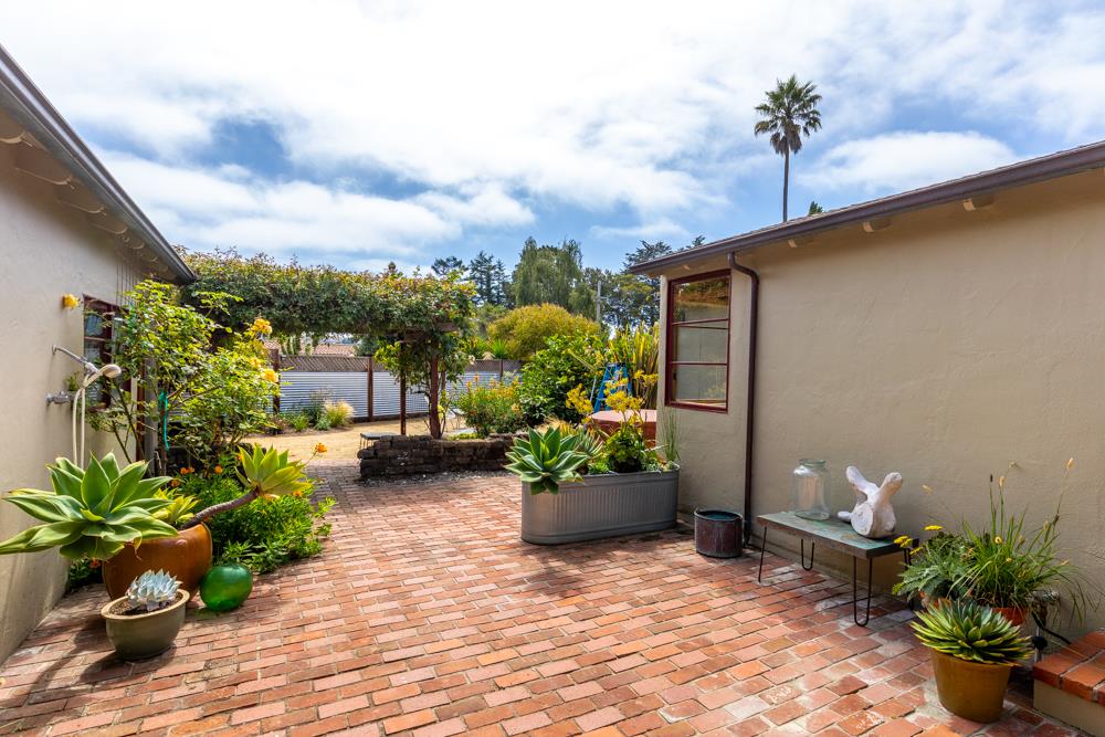 244 Aptos Beach Drive Aptos, CA 95003 - Photo 28 of 32 a view of a entryway with flower pots