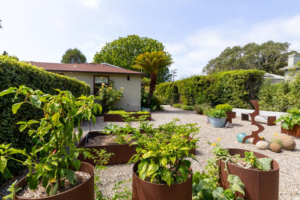244 Aptos Beach Drive Aptos, CA 95003 - Photo 30 of 32 a view of a garden with potted plants