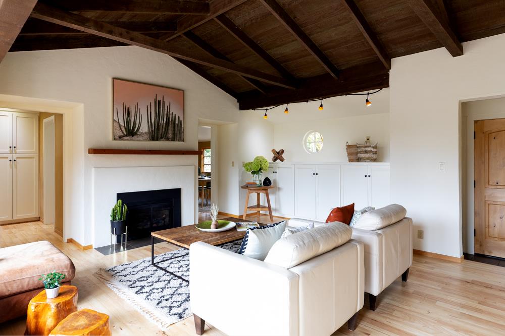 244 Aptos Beach Drive Aptos, CA 95003 - Photo 4 of 32 a living room with furniture and a fireplace