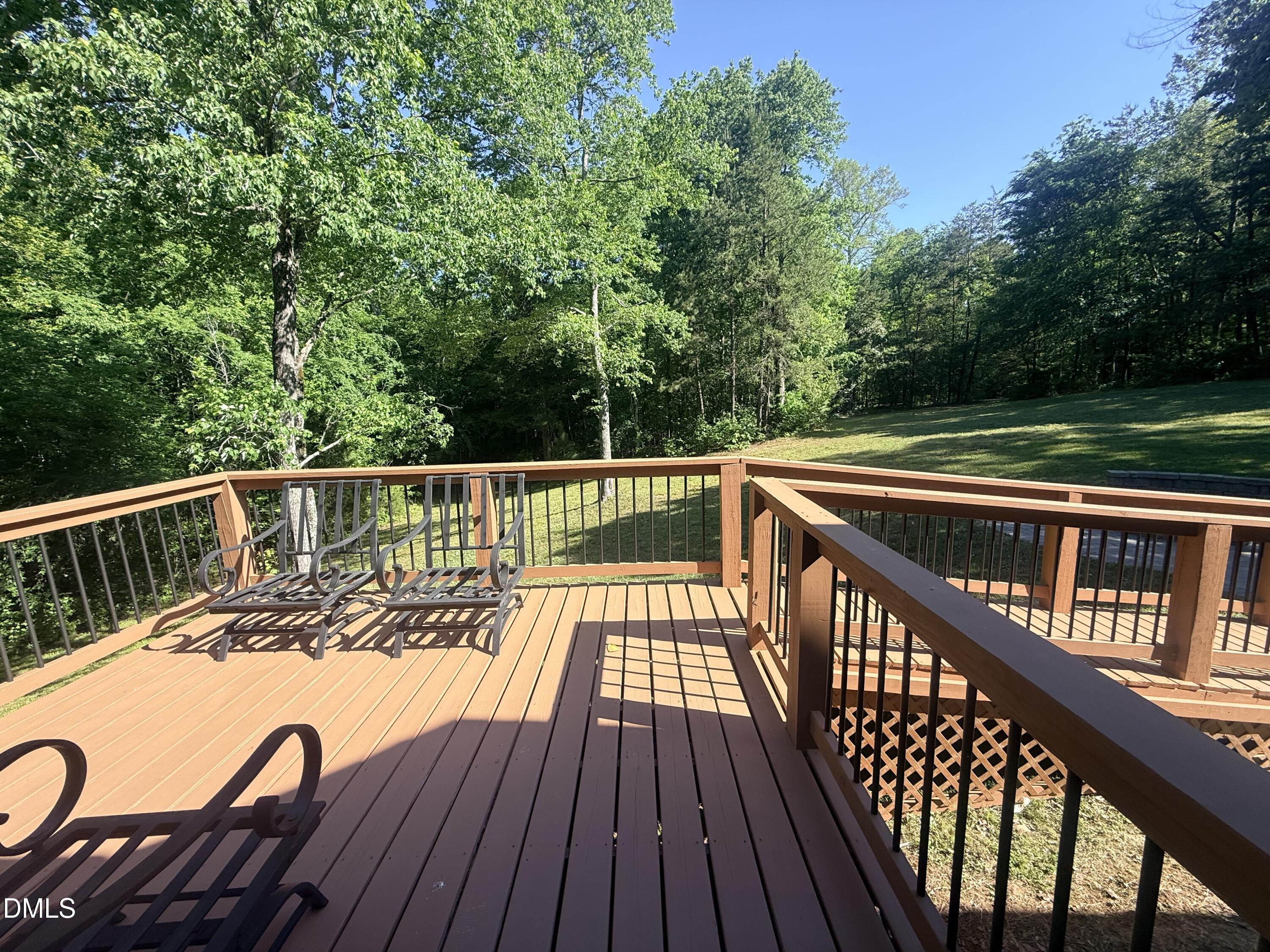 327 Shady Oak Road Roxboro, NC 27574 - Photo 21 of 62 a view of balcony with wooden floor and fence