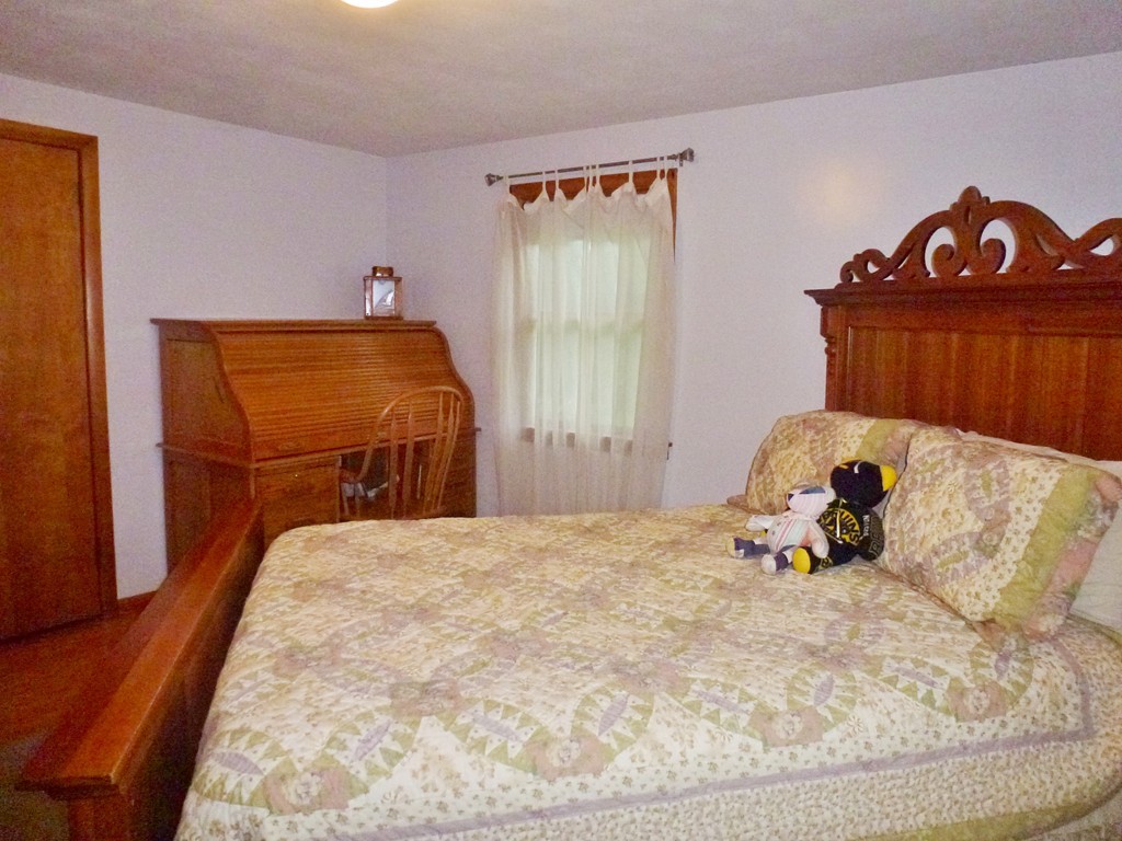 34 Exeter Street West Springfield, MA 01089 - Photo 21 of 25 a bedroom with a bed and window