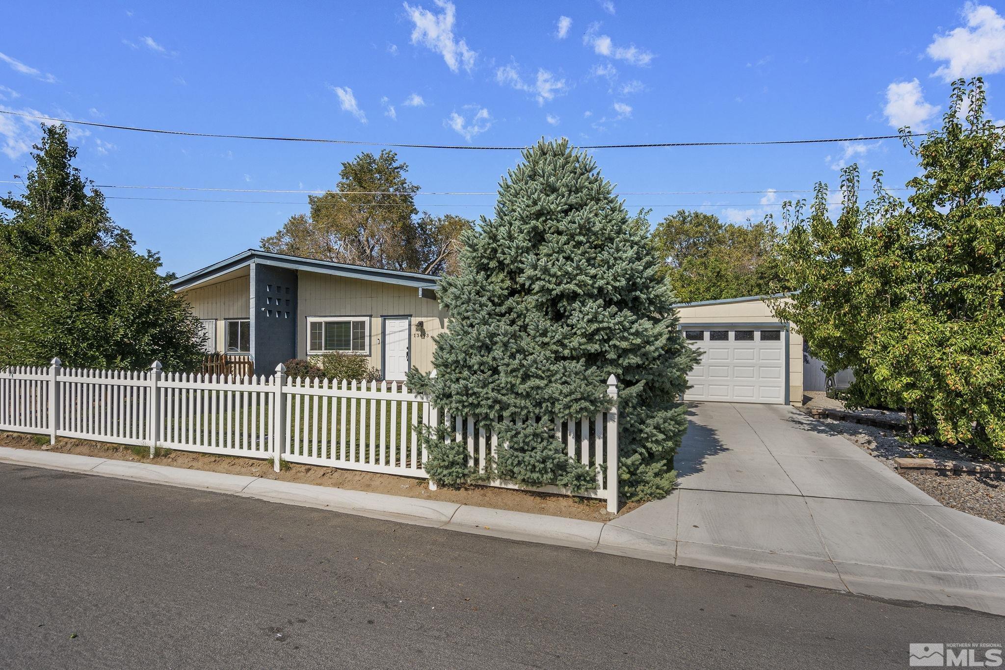 a view of a house with a garage
