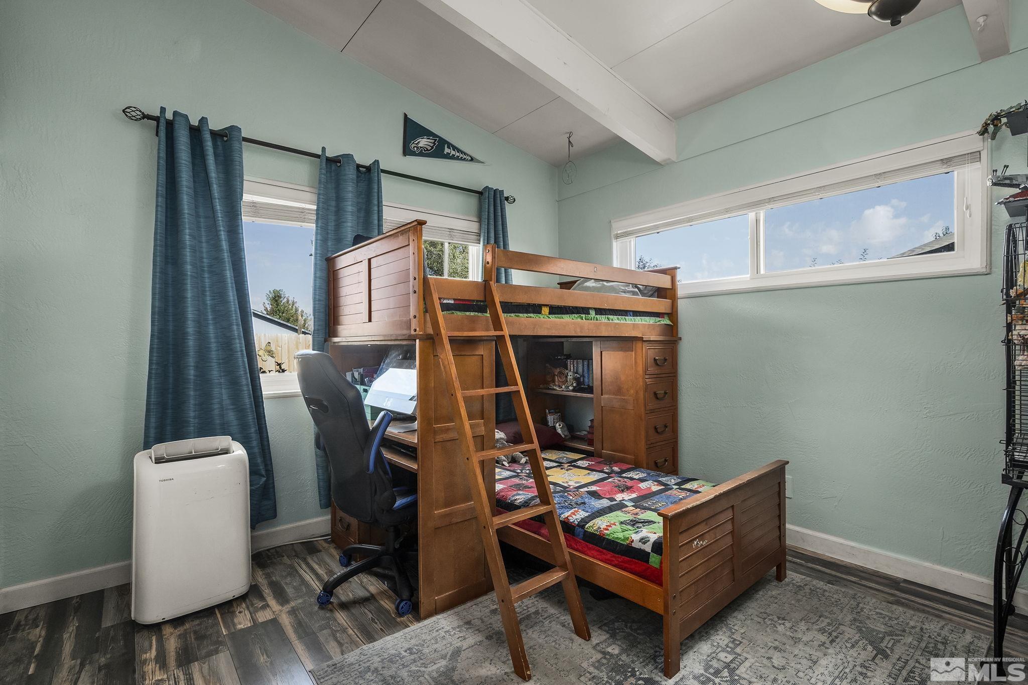 13693 Mt Baldy Street Reno, NV 89506 - Photo 11 of 18 a living room with furniture and a dining table