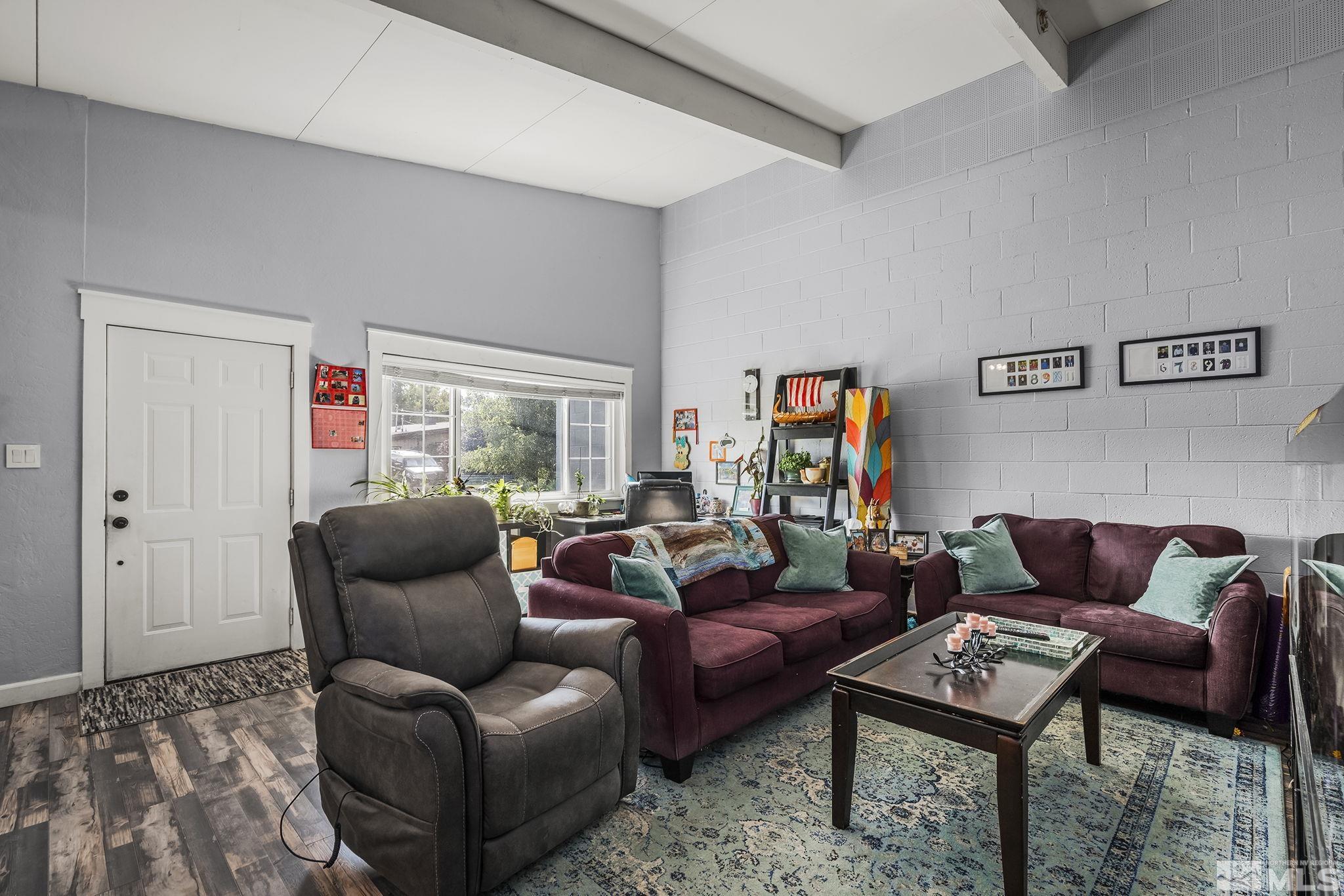 13693 Mt Baldy Street Reno, NV 89506 - Photo 5 of 18 a living room with furniture and a rug