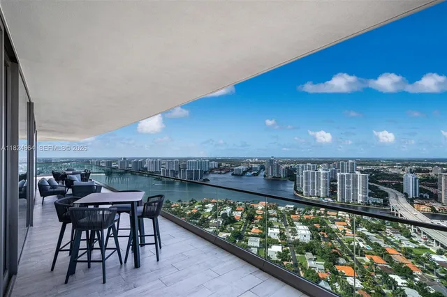a view of a chairs and table in patio