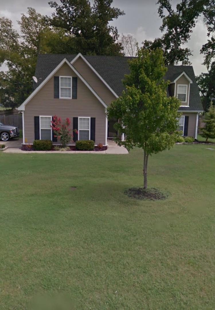 691 Crescent Road Murfreesboro, TN 37128 - Photo 1 of 15 a front view of a house with a garden