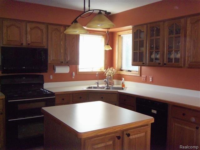 8112 Lee Road Brighton, MI 48116 - Photo 11 of 30 Kitchen island.JPG
