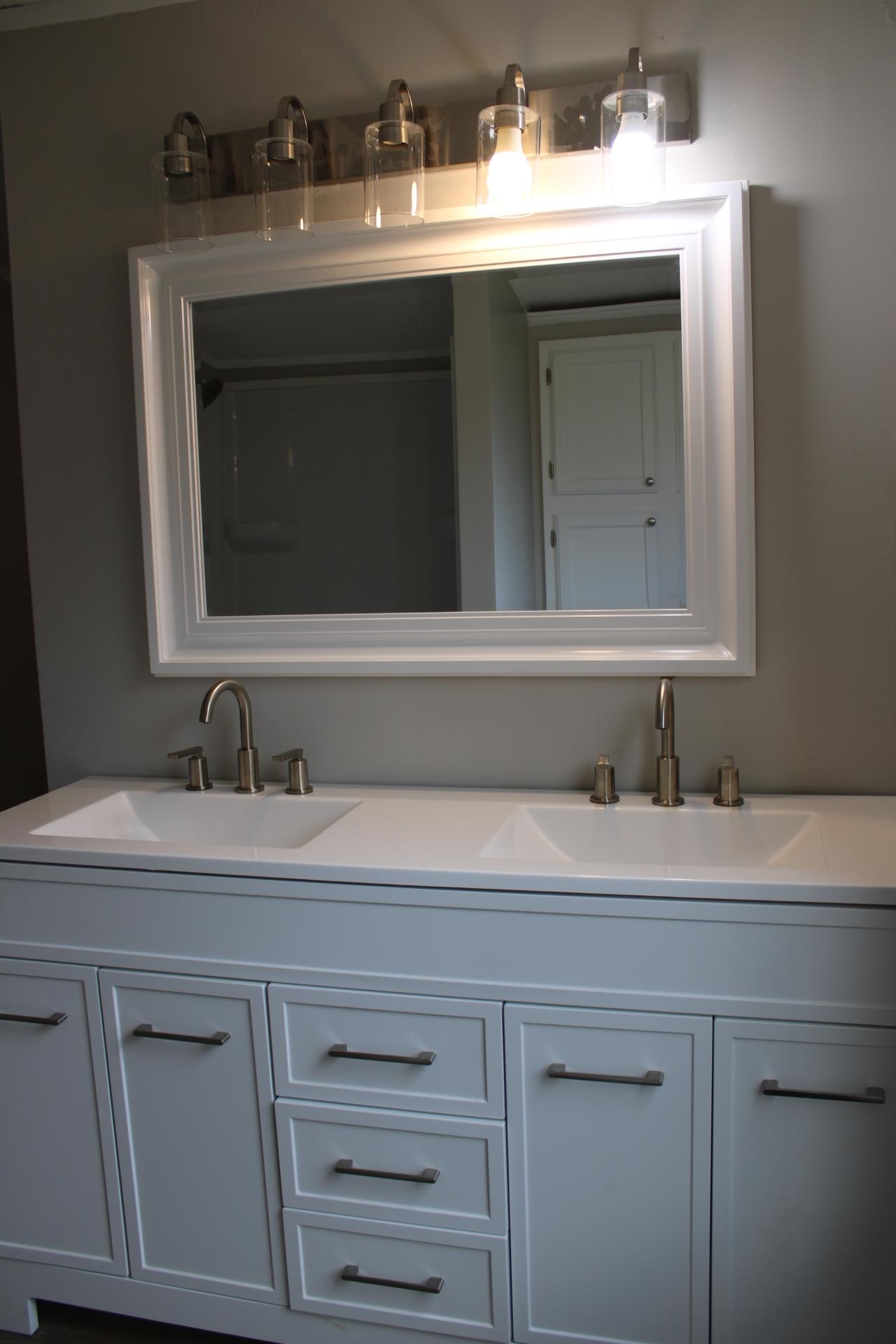 1535 Sand Ford Road Henning, TN 38041 - Photo 15 of 40 a bathroom with a sink and a mirror