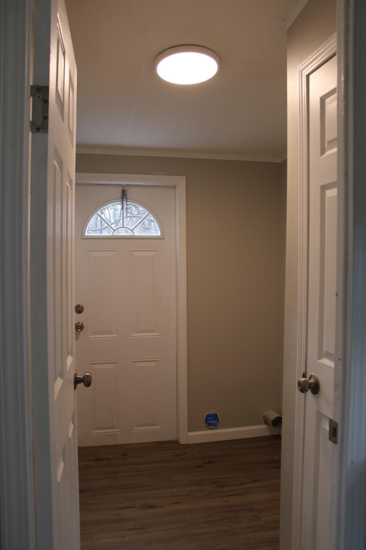 1535 Sand Ford Road Henning, TN 38041 - Photo 35 of 40 a view of room with window and wooden floor