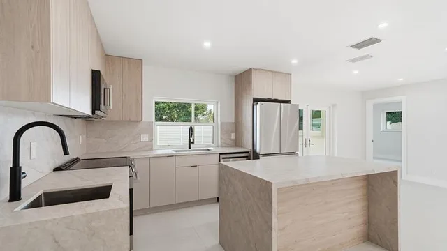 a living room with a couch and a window