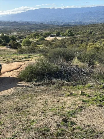 a view of lake with mountain