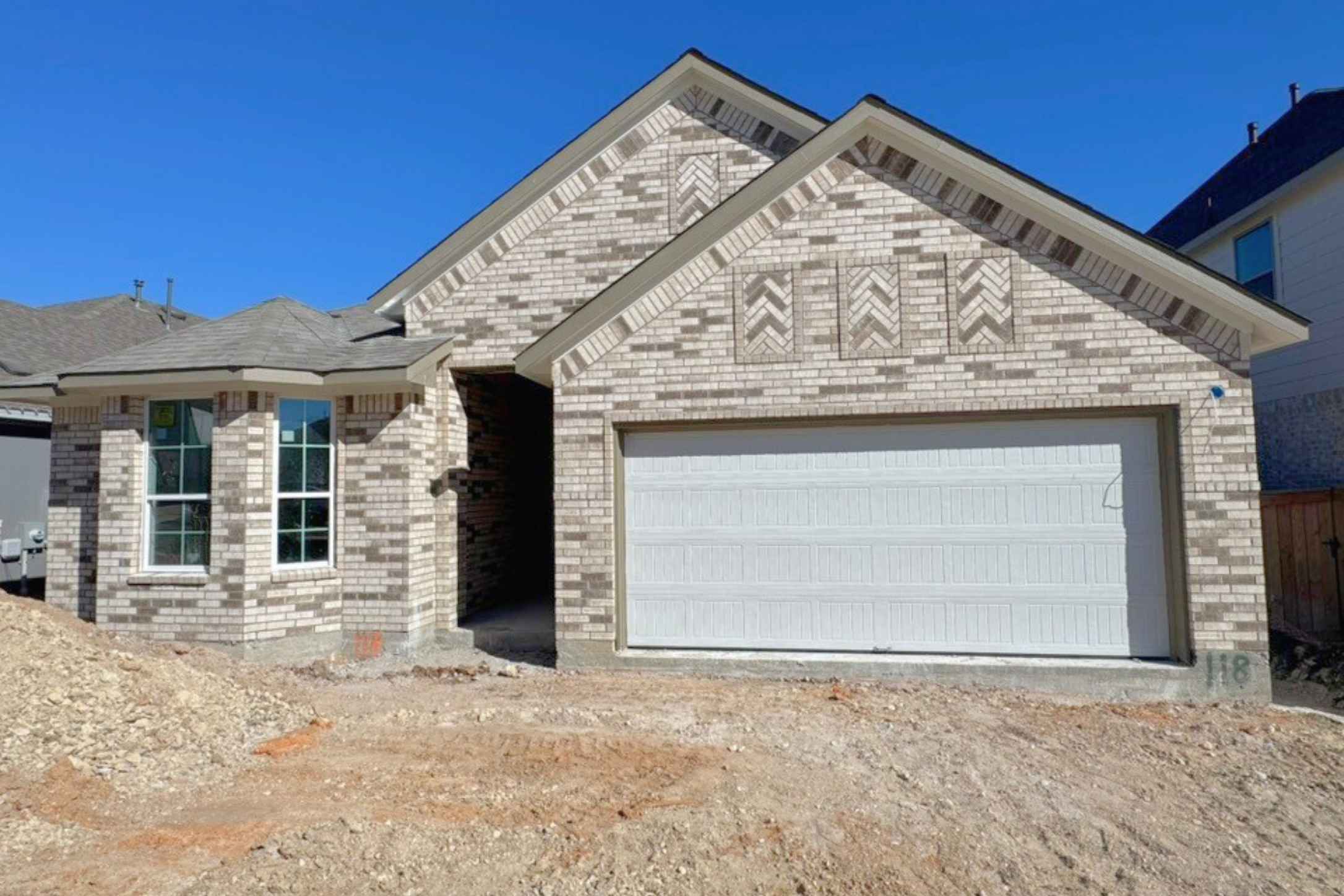 118 Ash Juniper Road Georgetown, TX 78633 - Photo 1 of 1 View of front of property with brick siding, a garage, and driveway