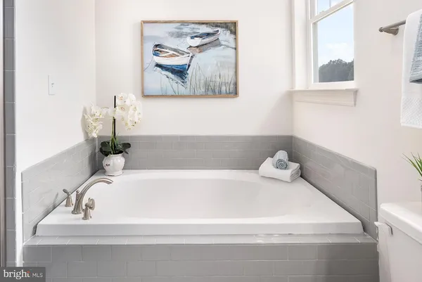 a bathroom with a bathtub