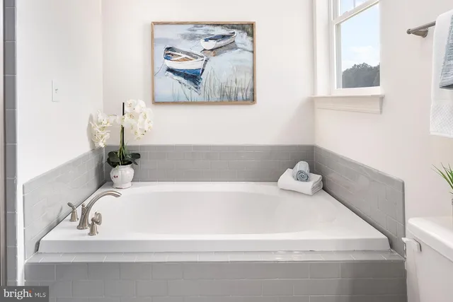 a bathroom with a bathtub