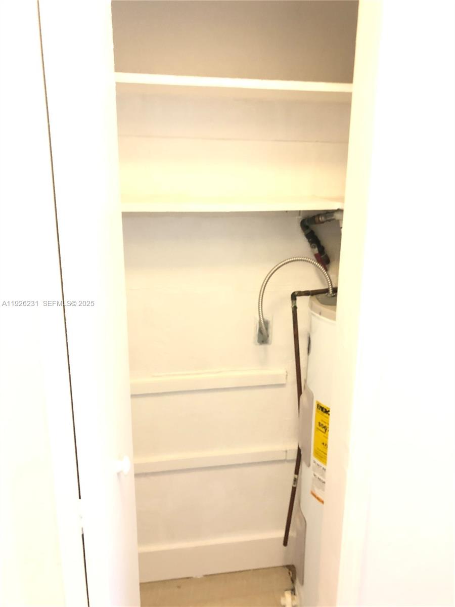 8340 Crespi Boulevard, Unit 19 Miami Beach, FL 33141 - Photo 20 of 35 a bathroom with a shower