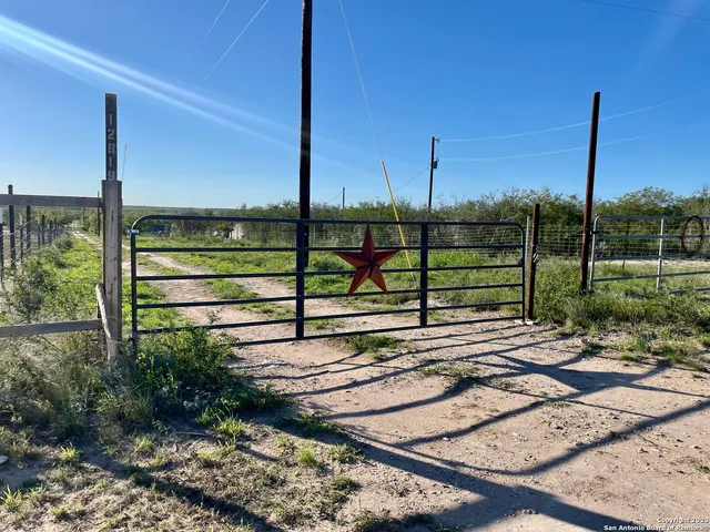 a view of a road with a yard