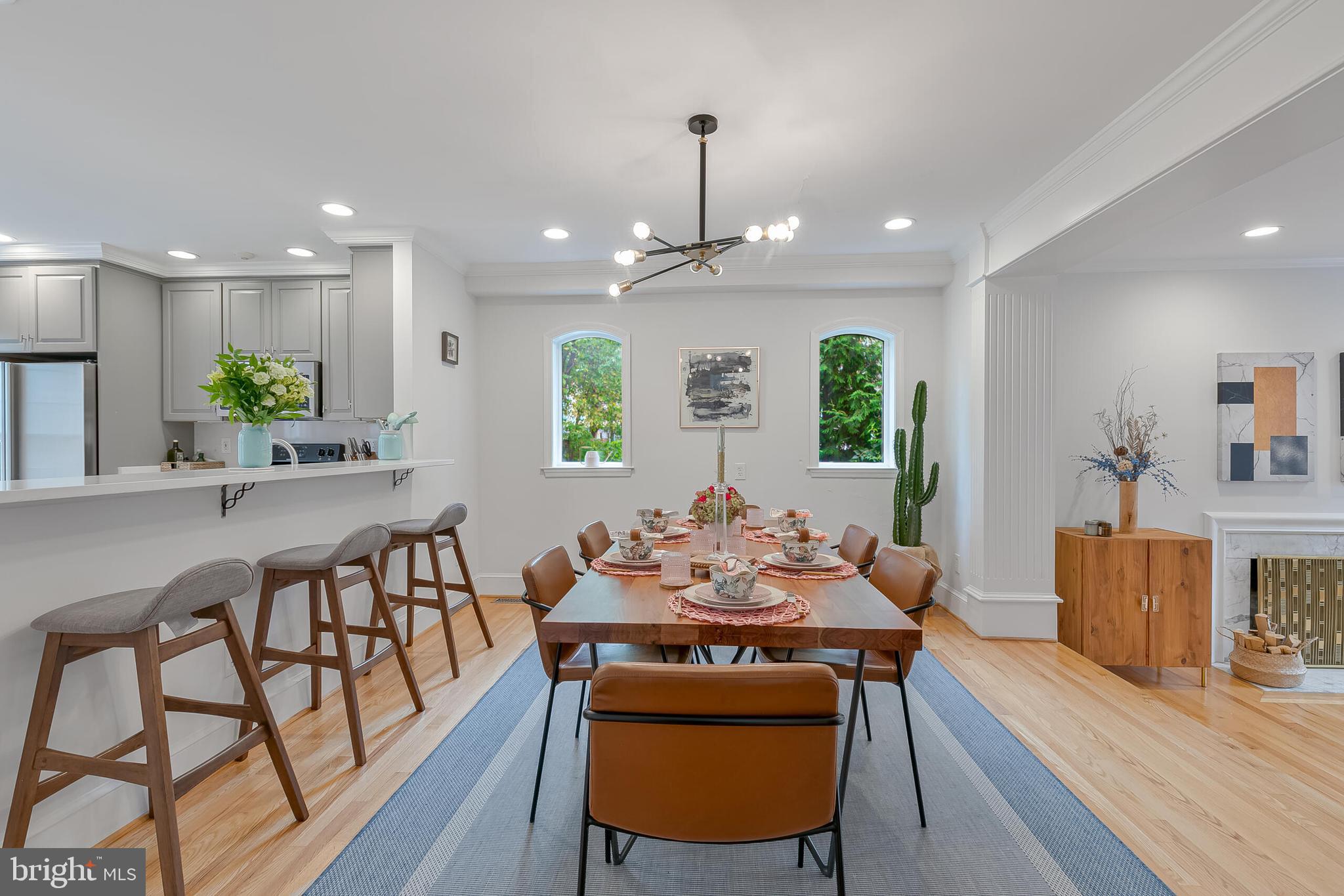 1340 North Lynnbrook Drive Arlington, VA 22201 - Photo 16 of 57 a view of a dining room with furniture window and wooden floor