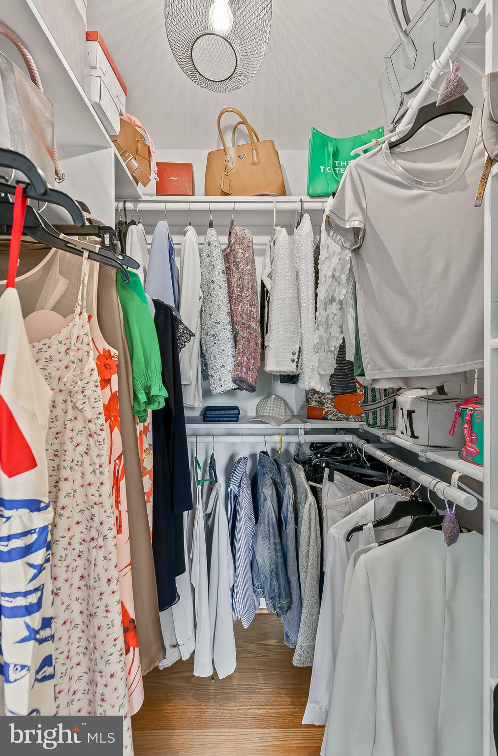 1340 North Lynnbrook Drive Arlington, VA 22201 - Photo 25 of 57 a view of walk in closet with clothes and shoes