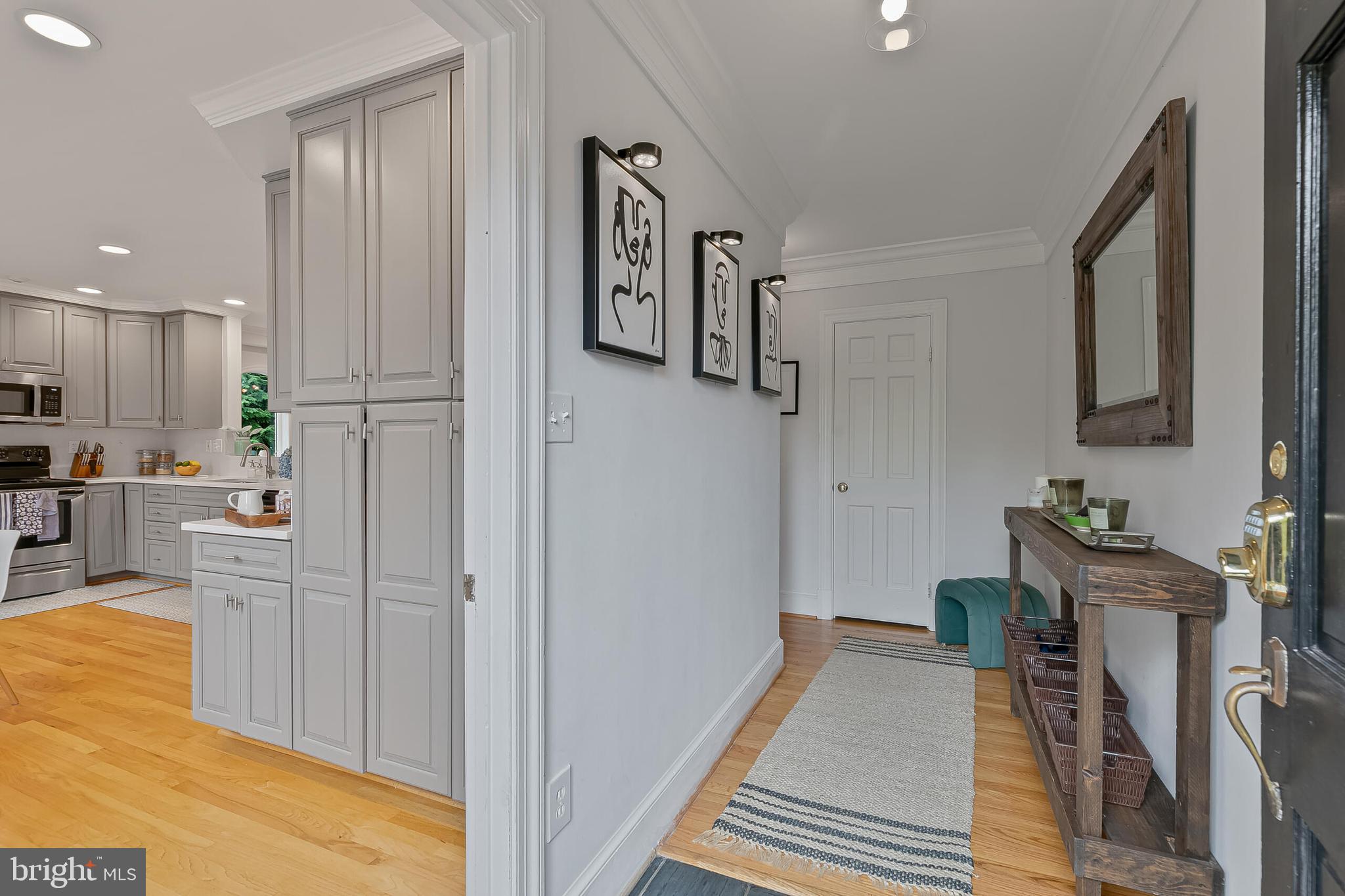 1340 North Lynnbrook Drive Arlington, VA 22201 - Photo 3 of 57 a view of a kitchen with furniture and staircase