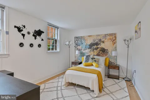 a view of a livingroom with furniture and a fireplace