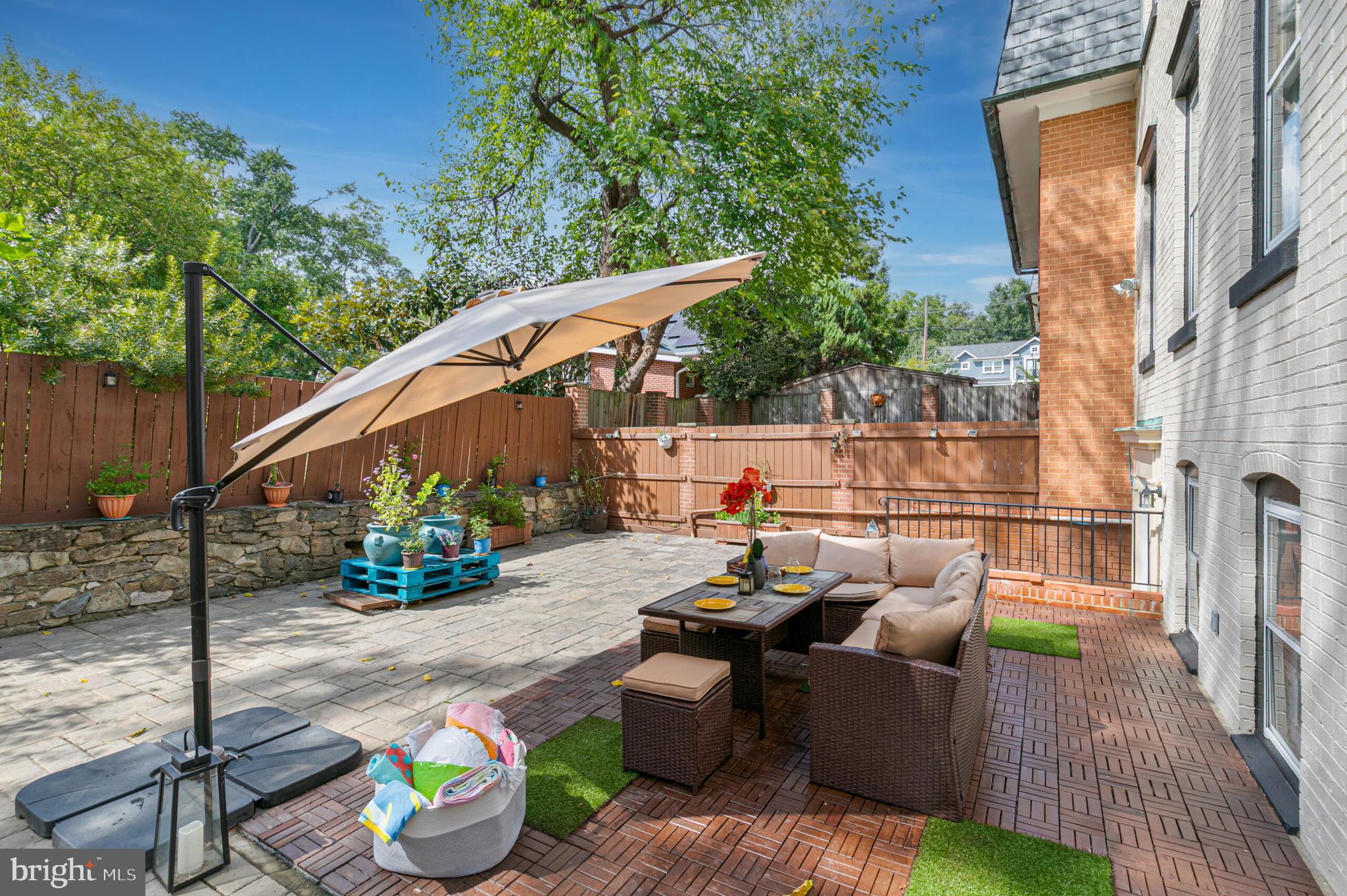 1340 North Lynnbrook Drive Arlington, VA 22201 - Photo 47 of 57 a patio with patio a couch and chairs
