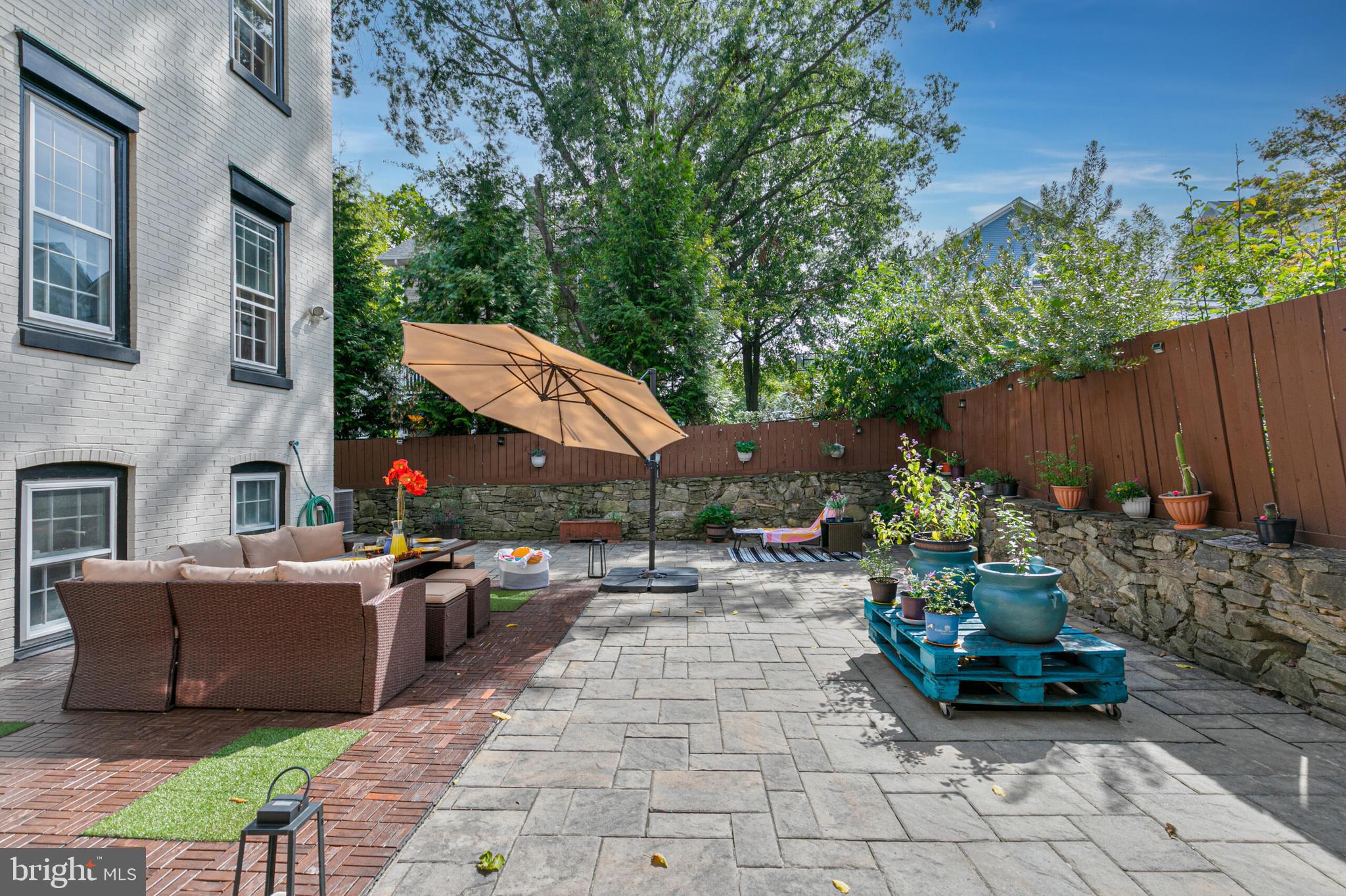 1340 North Lynnbrook Drive Arlington, VA 22201 - Photo 49 of 57 a backyard of a house with yard and outdoor seating