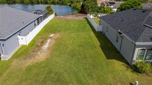 a view of a swimming pool with a backyard