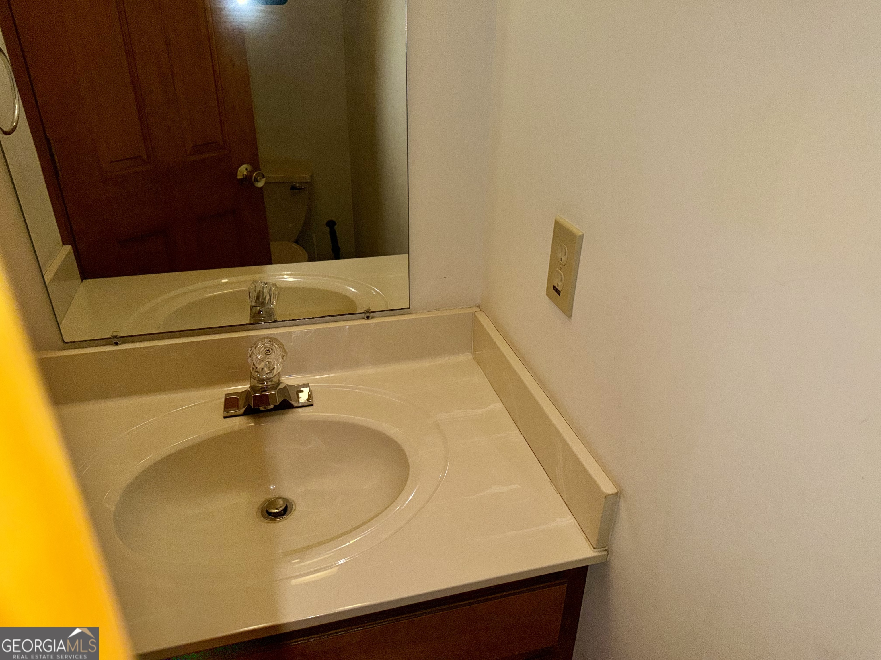 494 Broad Street Bowman, GA 30624 - Photo 28 of 65 a bathroom with a sink and a mirror