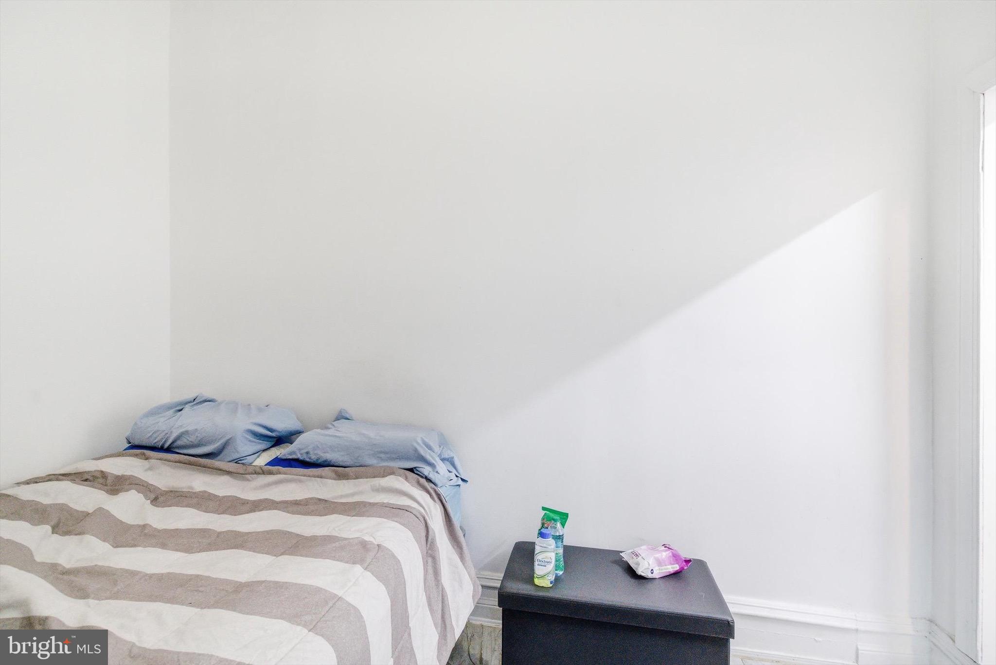 400 North 5th Street Reading, PA 19601 - Photo 8 of 25 a bedroom with a bed and cabinets